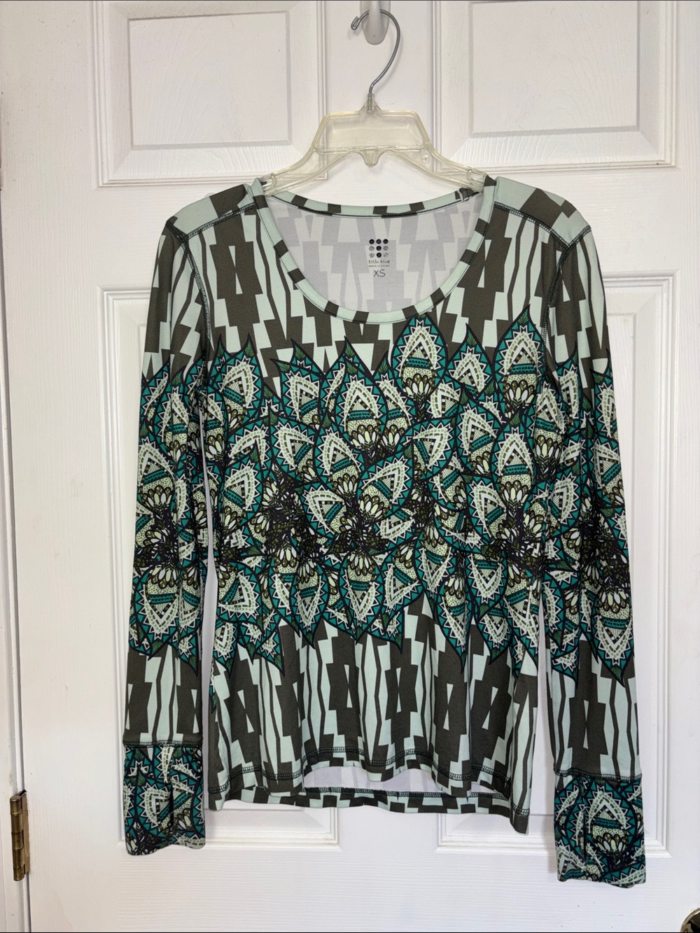 Title Nine Mint Teal Geometric Athletic Long-Sleeve Top with thumbholes.